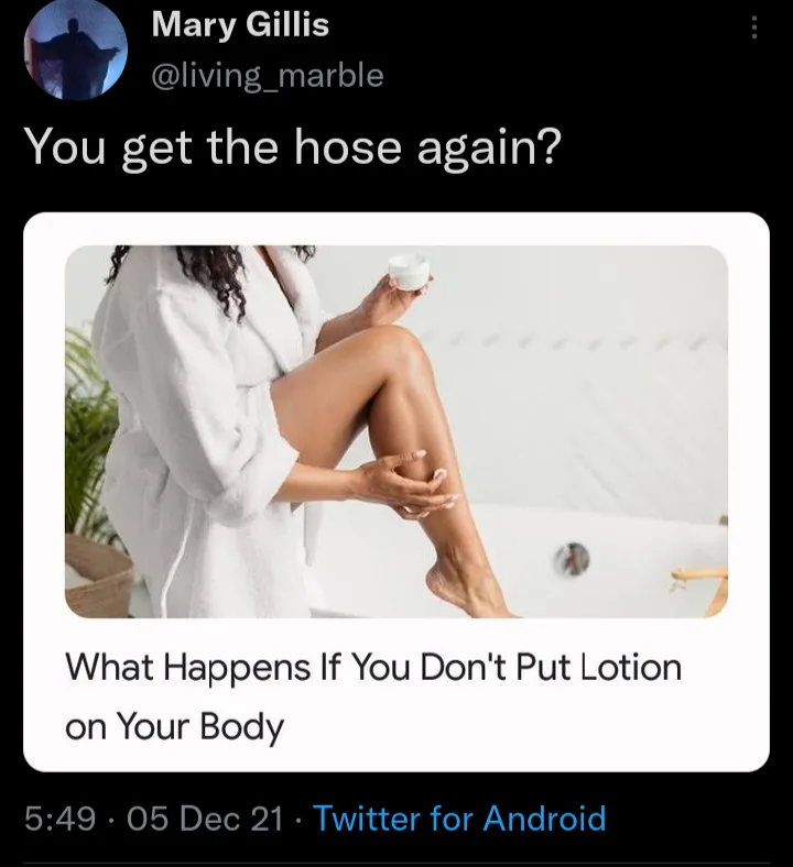 A screenshot of a tweet by Mary Gillis (@living_marble) shows a woman in a white robe applying lotion to her leg. The…
