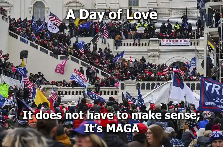 A large crowd of people, many wearing red hats and holding American flags and 'TRUMP 2020' signs, gathers on the steps of a…