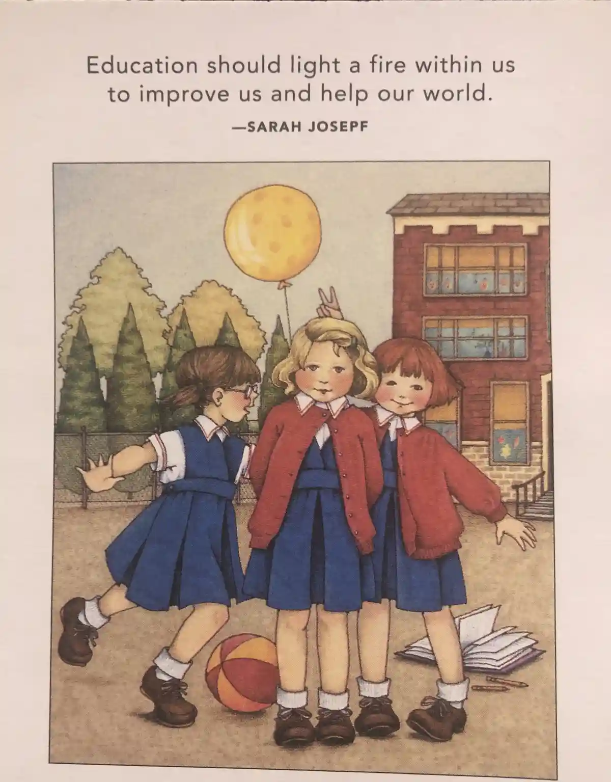 An illustration of three schoolgirls in blue uniforms and red cardigans playing outside a brick school building, with a…