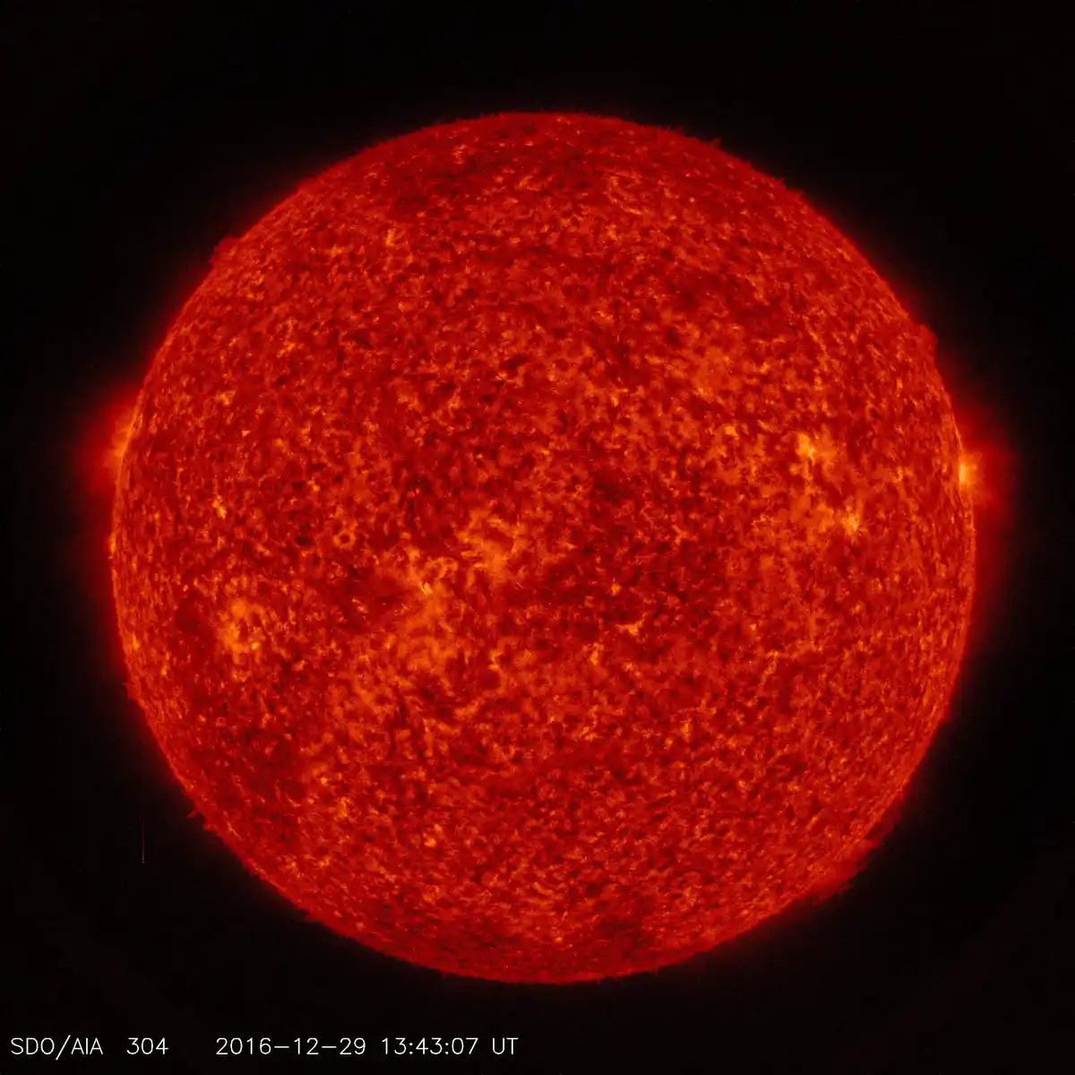 A high-resolution image of the sun captured by NASA's SDO/AIA instrument on December 29, 2016, showing its turbulent, fiery…