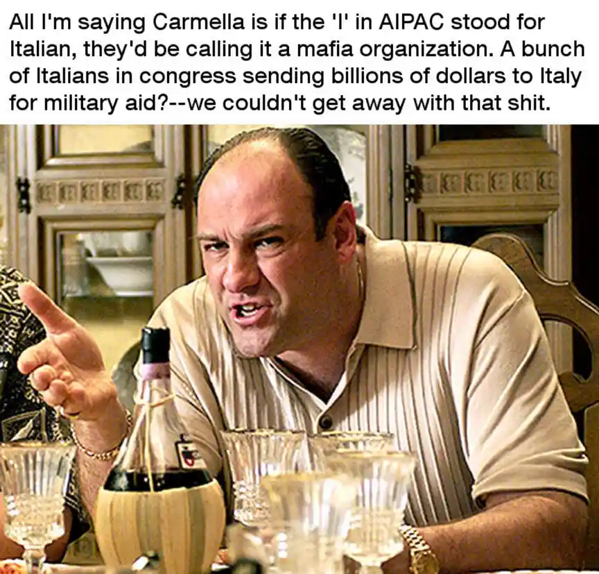 A man with a receding hairline and striped polo shirt sits at a dining table with glasses and a bottle, pointing angrily…
