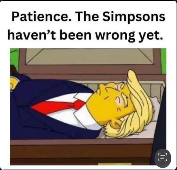 A still from The Simpsons shows a character with blonde hair, wearing a dark suit and red tie, lying in a coffin with eyes…