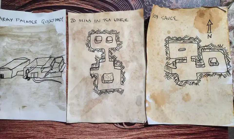 Three hand-drawn, stained papers resembling ancient maps show a blocky, Minecraft-style structure at different stages of…