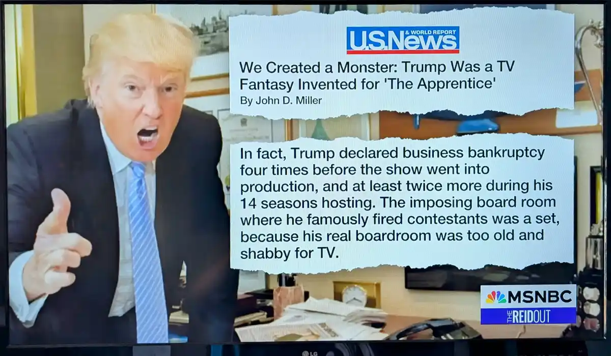 A screenshot of a television broadcast showing Donald Trump in an office, looking angry and gesturing with his right hand…