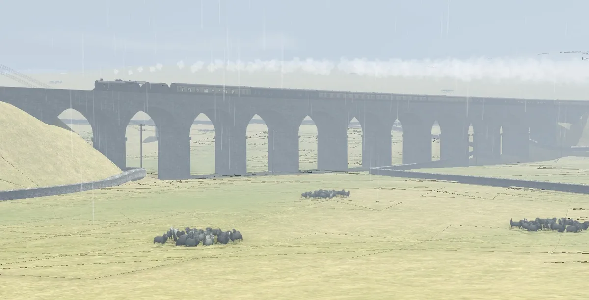 A screenshot from a train simulation game shows a steam train crossing a large stone viaduct under heavy rain, with several…