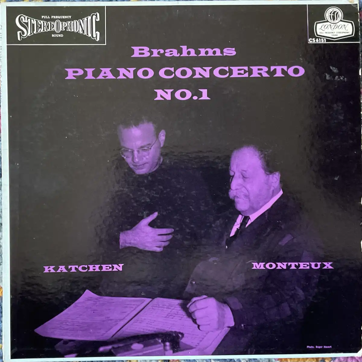 A vintage purple-tinted album cover for 'Brahms Piano Concerto No.1' by London Records, featuring two men, Katchen and…