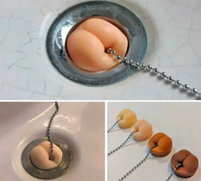 A composite image showing a realistic silicone butt plug attached to a sink drain chain, with a close-up of the plug and a…