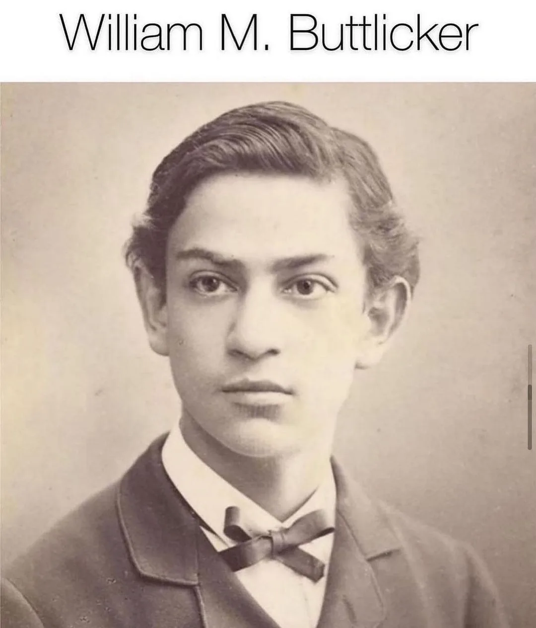 A sepia-toned vintage portrait of a young man with neatly combed hair, wearing a formal suit jacket, white collared shirt…
