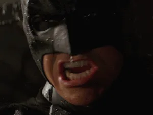 A six-panel image sequence showing Batman from the 1989 movie, his mouth opening wider in each frame as if screaming or…