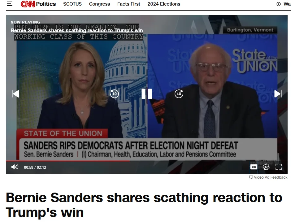 A screenshot of a CNN Politics video player shows Sen. Bernie Sanders speaking on a blue 'State of the Union' set, while a…