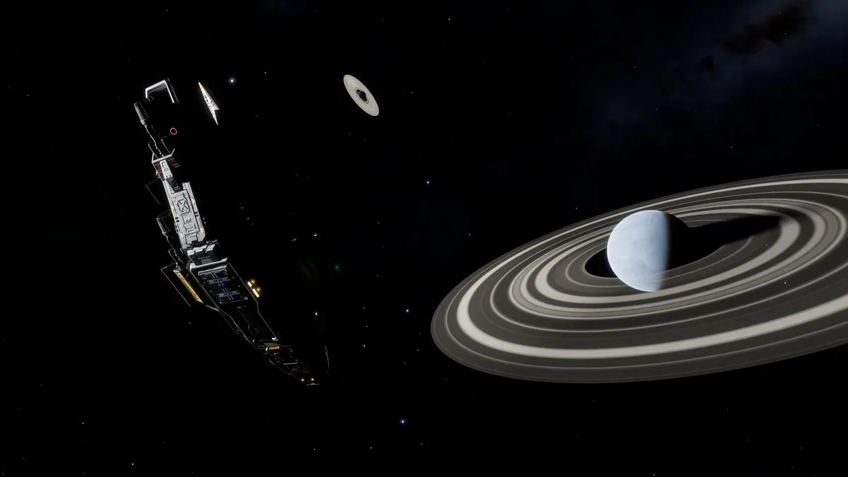 A spaceship flies through space near a large ringed planet, with a smaller ringed object in the distance. The overlaid text…