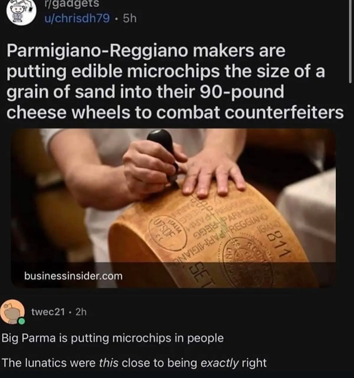 A close-up image shows a person stamping a large, round, 90-pound Parmigiano-Reggiano cheese wheel with official markings…
