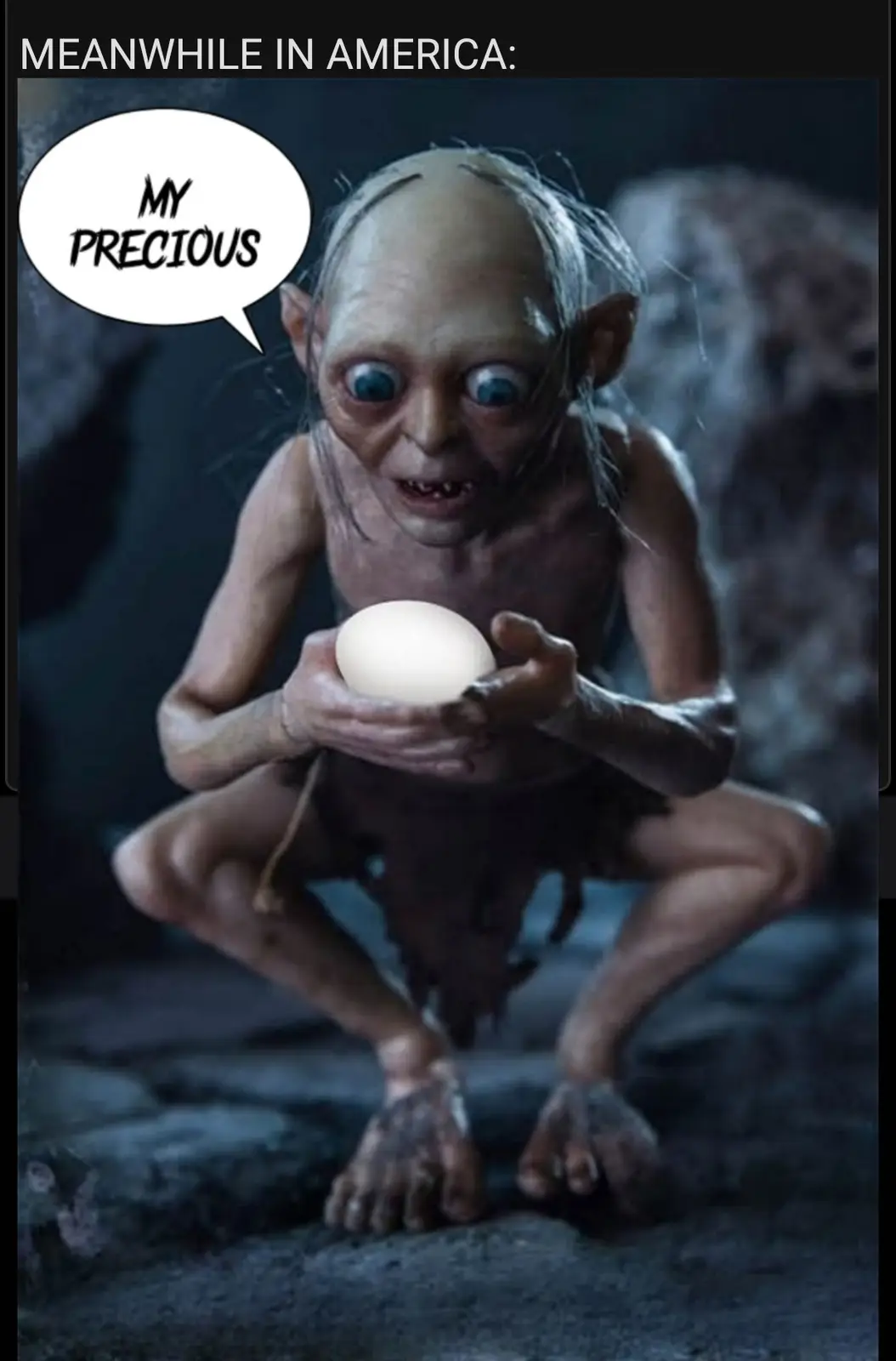 A small, pale, bald, elf-like creature with large blue eyes and pointed ears crouches on rocky ground, holding a white egg…