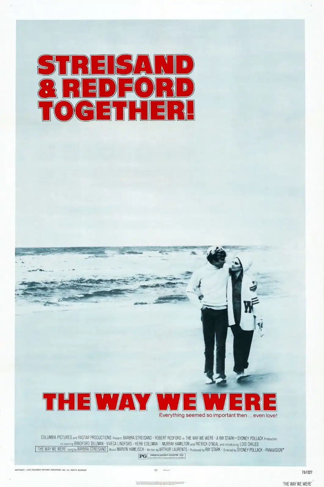 A vintage movie poster for 'The Way We Were' shows Barbra Streisand and Robert Redford walking on a beach, with large red…