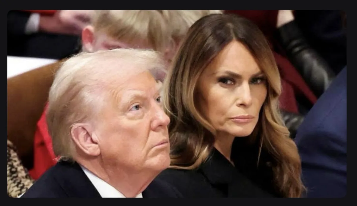 A photo shows former president donald trump and his wife melania sitting side by side, both looking forward with serious…