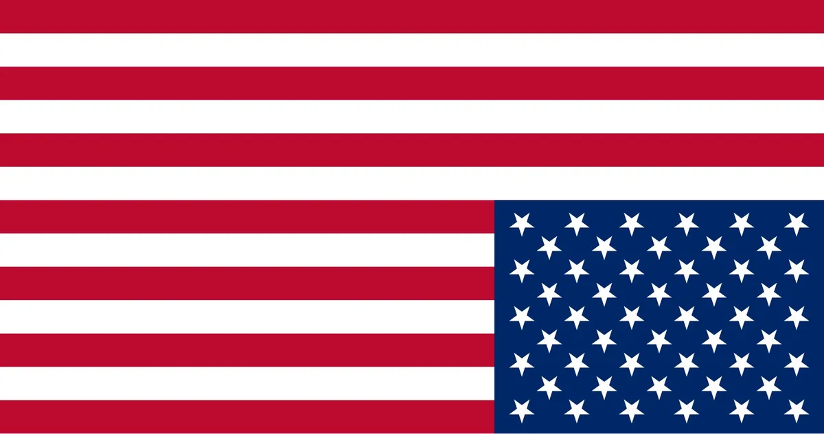 The image displays the flag of the United States of America, featuring 13 horizontal red and white stripes and a blue canton…