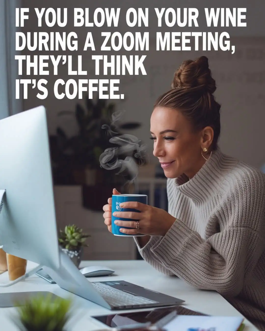 A woman in a beige sweater sits at a desk with a laptop, blowing on a blue mug that emits steam, while large white text…
