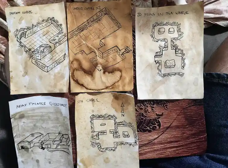 Five hand-drawn, stained paper maps depict a blocky, Minecraft-style structure, each labeled with a different method of…