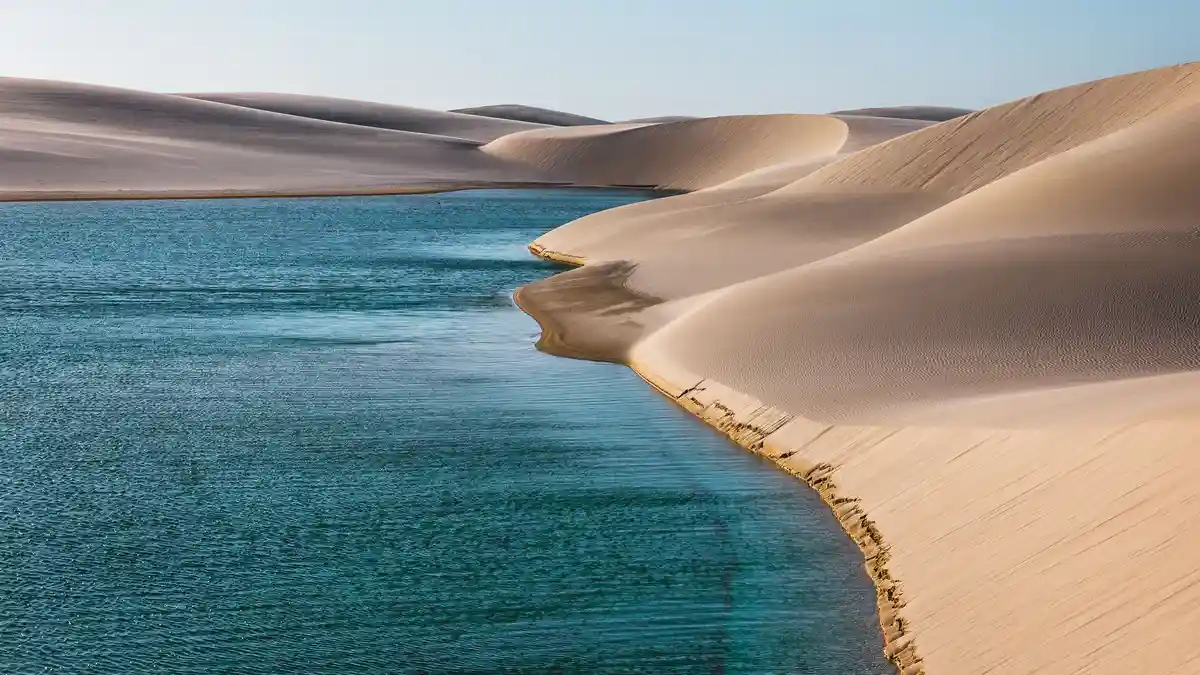 In Brazil's remote LenÃÂ§ÃÂ³is Maranhenses National Park, sugar-white sand dunes meet freshwater lagoons, filling valleys…