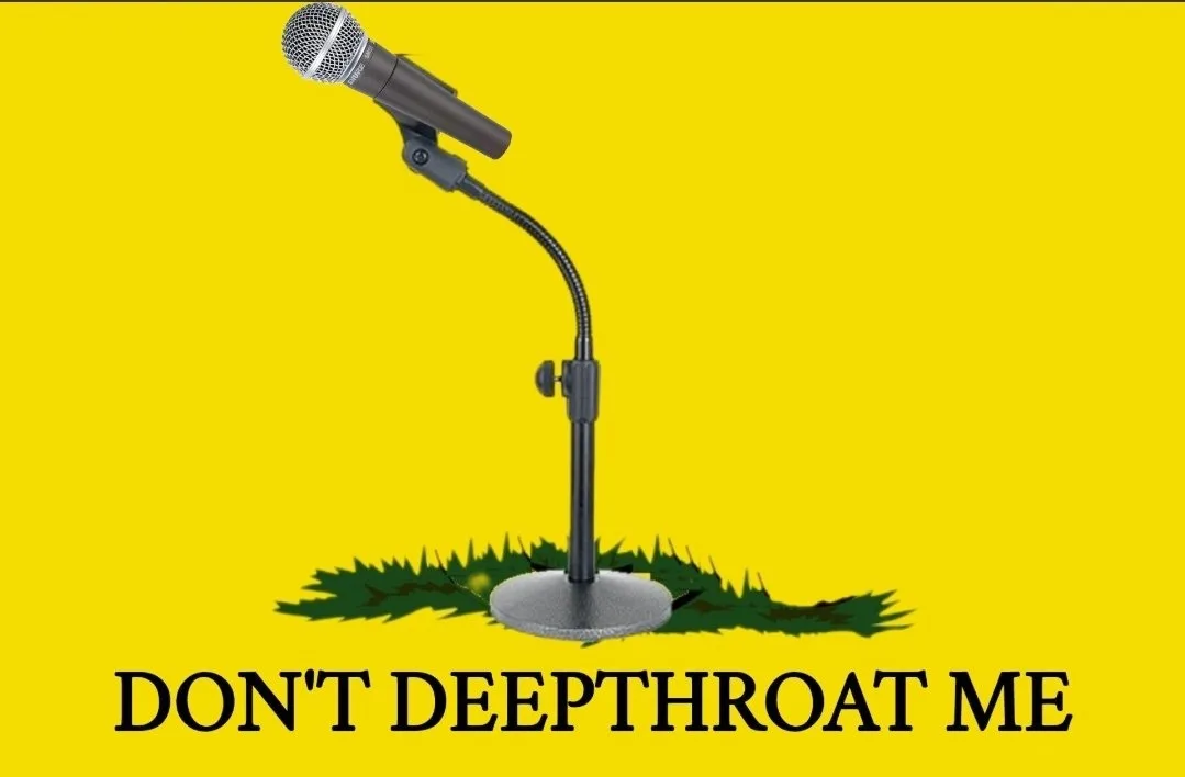 A black microphone on a flexible stand is shown against a solid yellow background, with a jagged green patch beneath the…