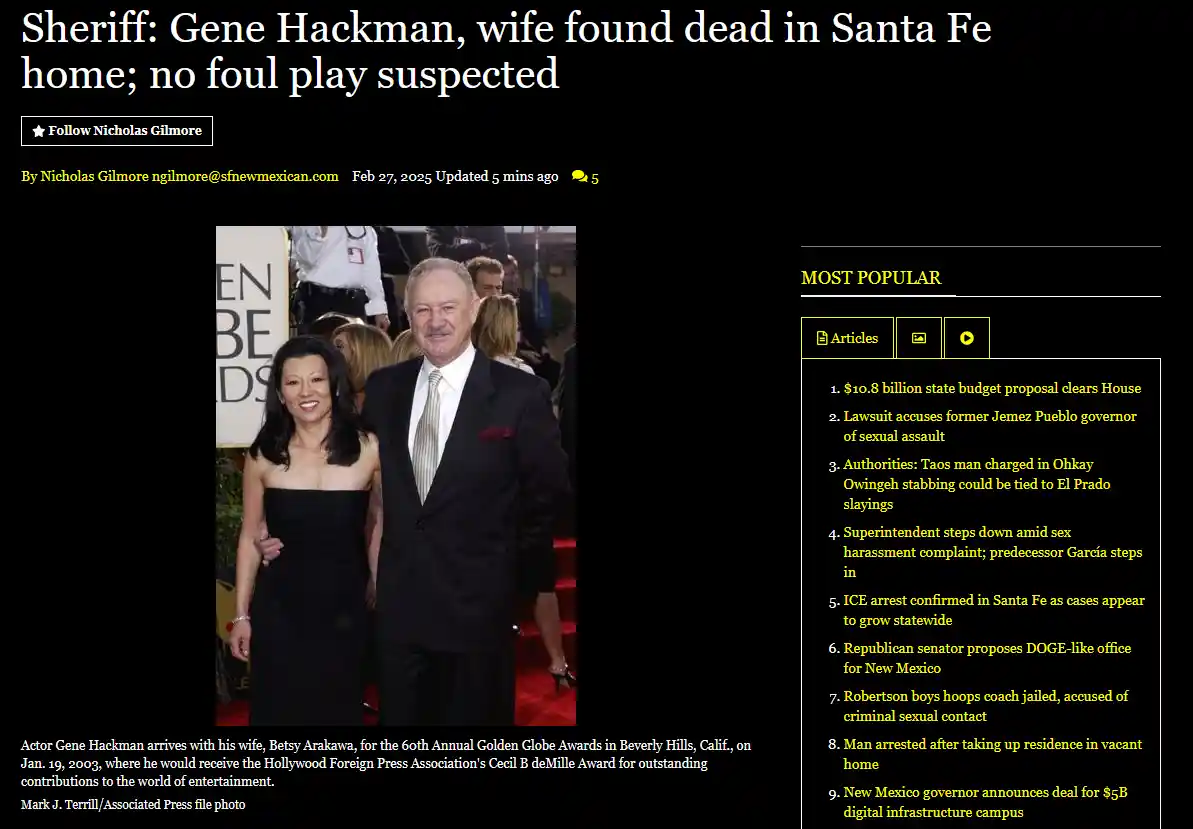 A screenshot of a news article shows a photo of actor Gene Hackman and his wife Betsy Arakawa smiling on a red carpet at the…