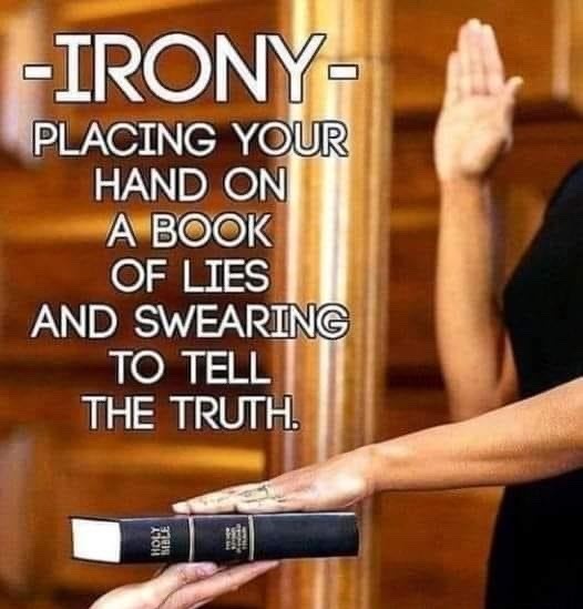 A person raises their right hand in an oath-taking gesture while placing their left hand on a black book labeled 'HOLY…