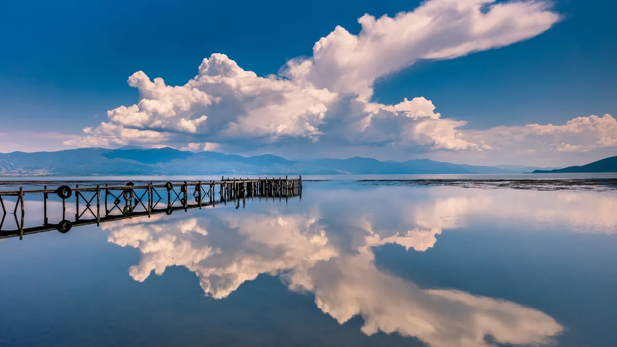 On the surface of Great Prespa Lake, three nations - North Macedonia, Albania, and Greece - meet at the tripoint. This…
