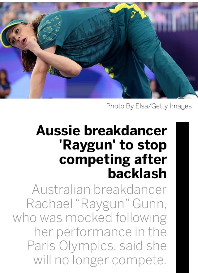 A photo of Australian breakdancer Rachael 'Raygun' Gunn in a green and yellow tracksuit, performing a breakdancing move with…