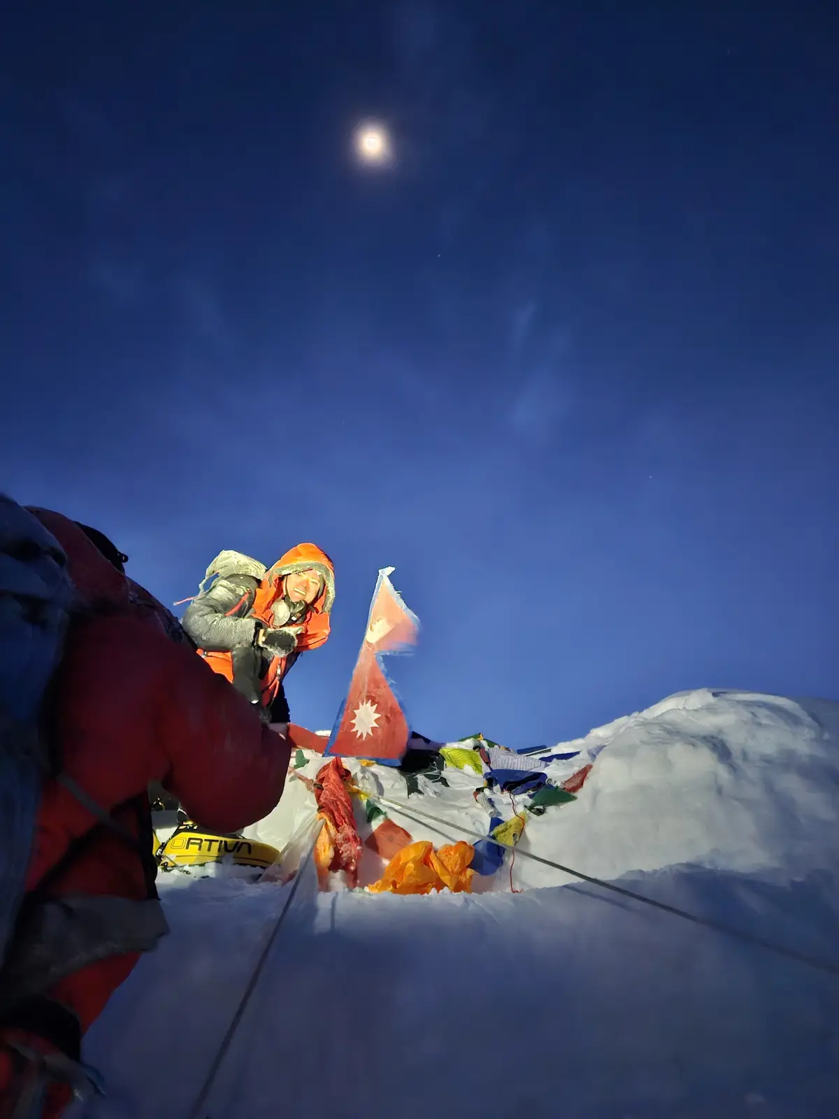 Reaching the summit under the stars.