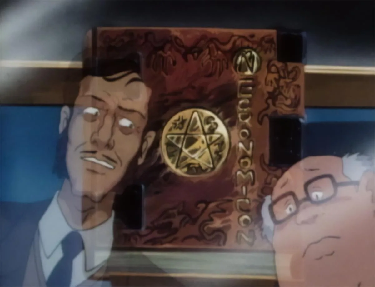 An anime still shows two men looking at a large, ornate book with a pentagram on its cover and the text 'Nudozoc-loc'…