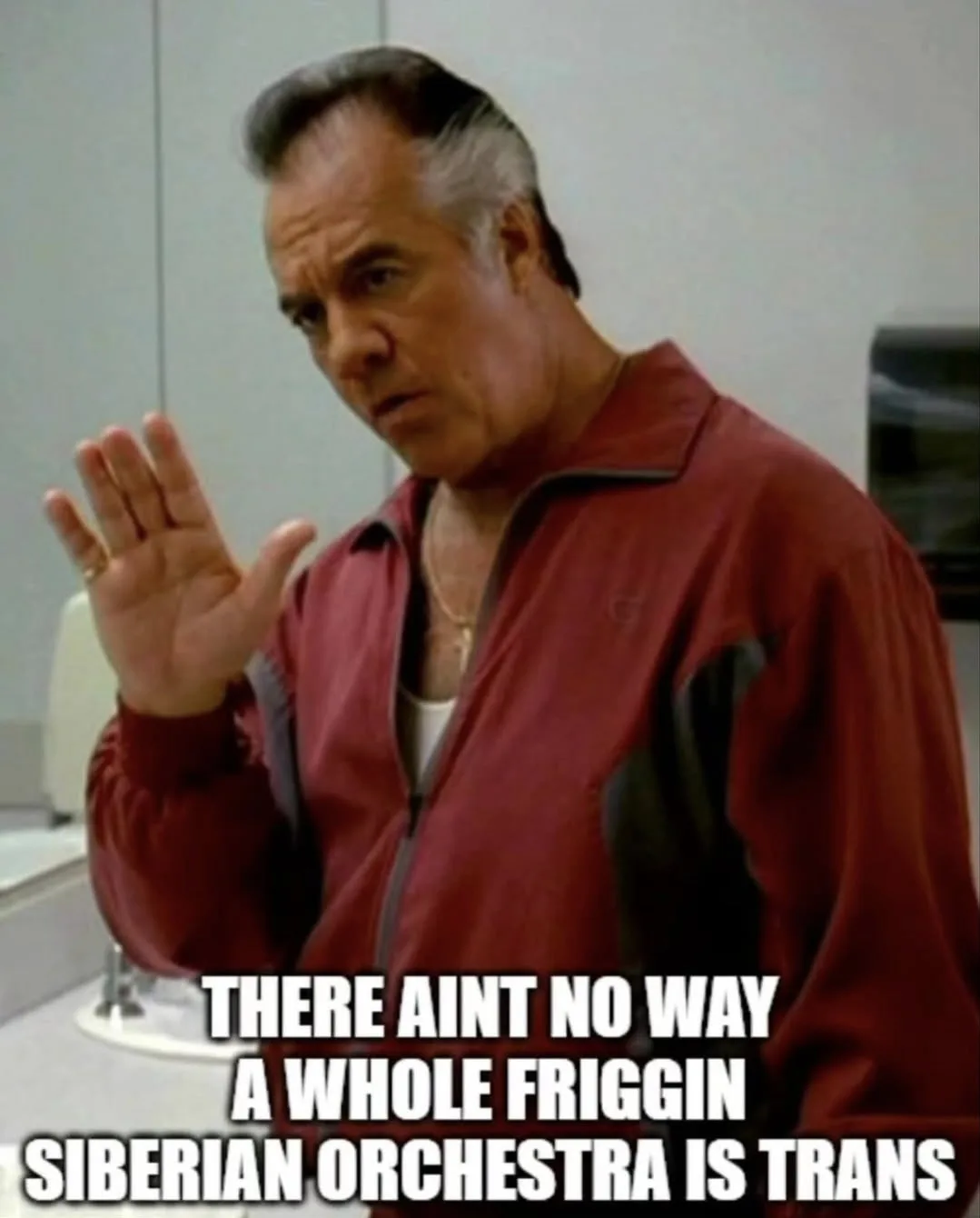 A man in a red jacket with a skeptical expression raises his hand in disbelief. The overlaid text reads 'THERE AINT NO WAY A…