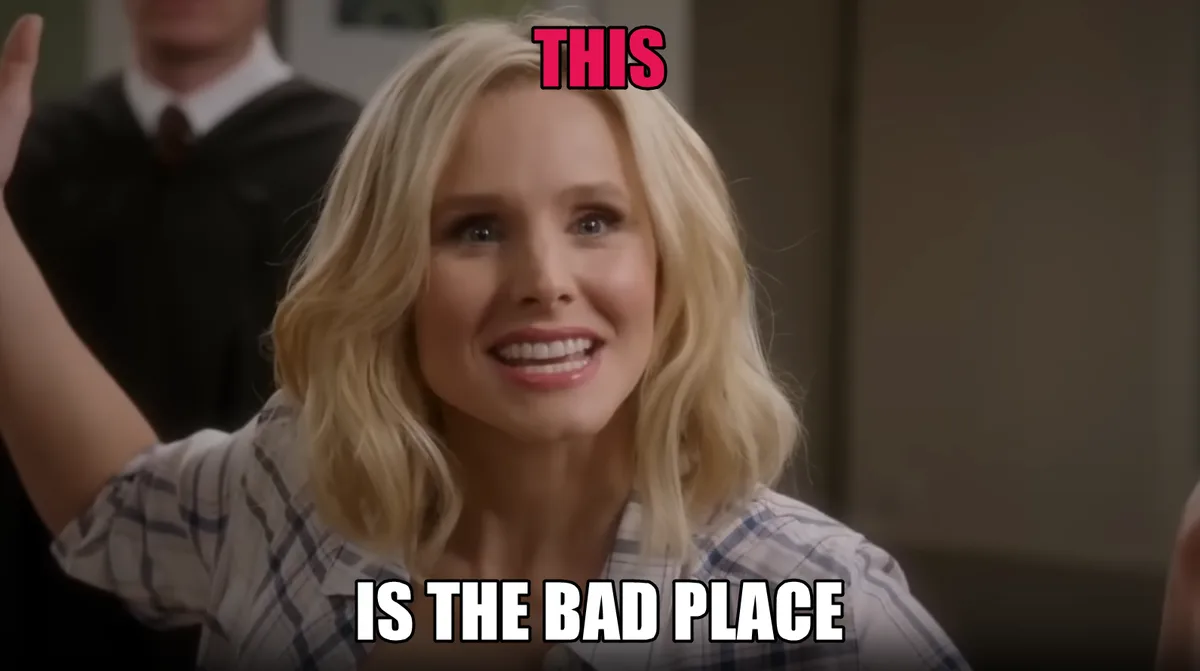 A blonde woman in a plaid shirt smiles brightly while raising her hand, with the text 'THIS' above her head and 'IS THE BAD…