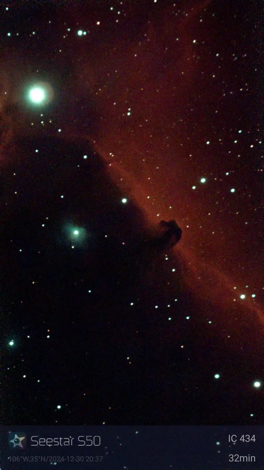 A deep-sky astrophotograph shows the IC 434 nebula, a dark silhouette against a glowing red emission nebula, with numerous…