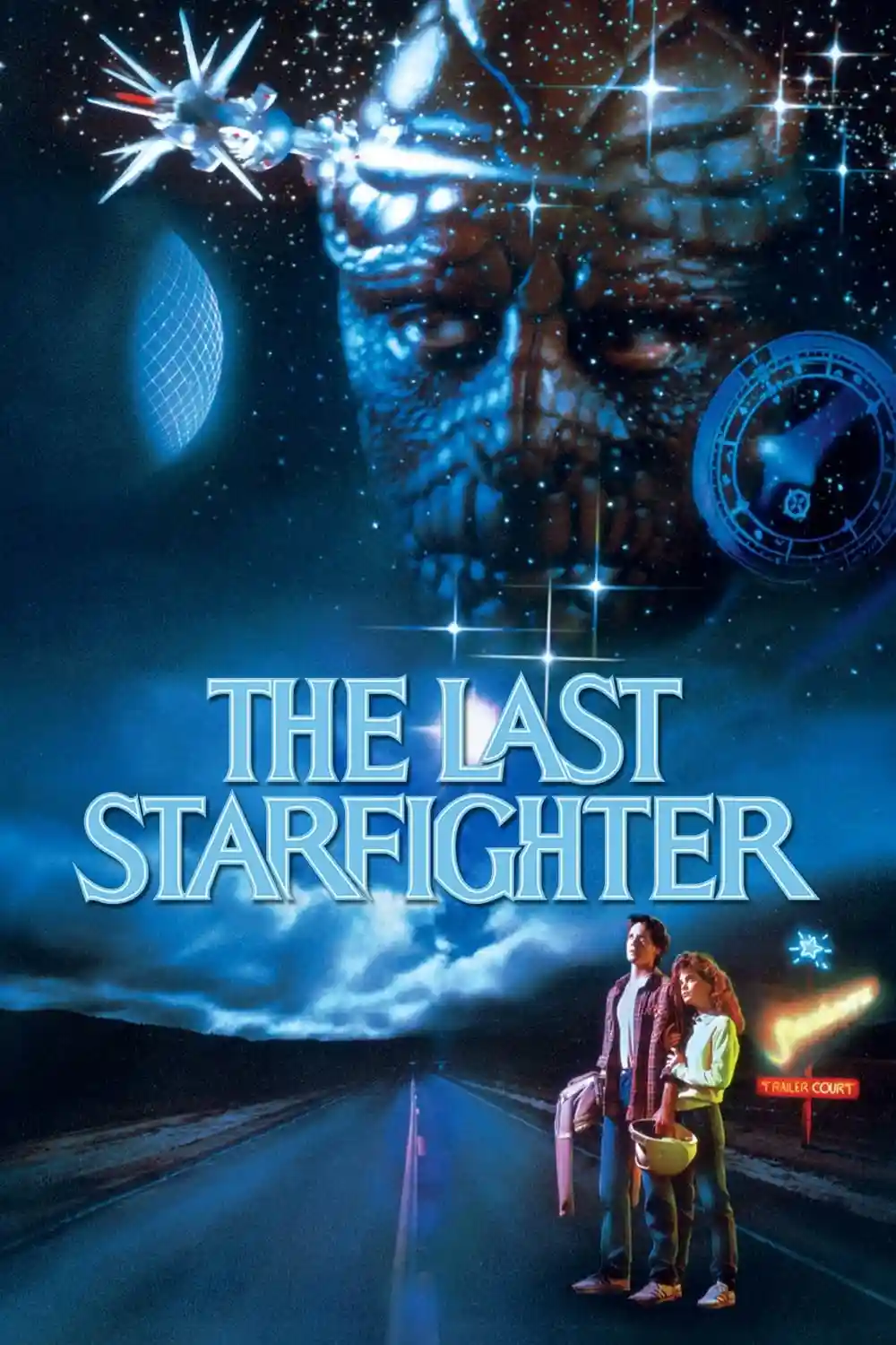 A movie poster for 'The Last Starfighter' shows two people standing on a roadside at night, looking up at a giant alien face…