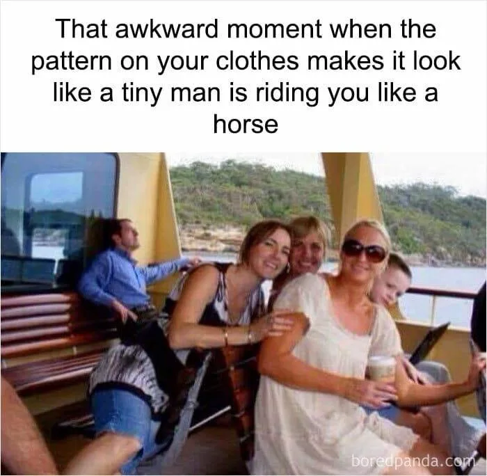 A group of people posing for a photo on a boat, with one woman in a patterned top where the design visually resembles a…