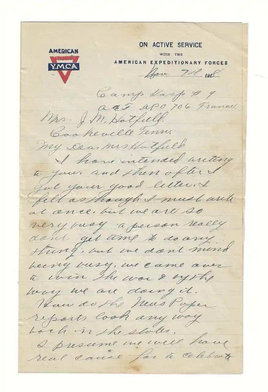 A vintage handwritten letter on official American YMCA stationery from a soldier 'on active service' with the American…