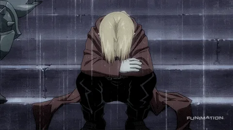 The image shows a character with long blonde hair, wearing a brown coat and black pants, sitting on wet concrete steps with…