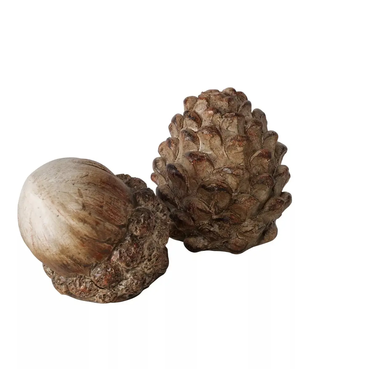 The image shows a pinecone and an acorn, both appearing as decorative, weathered wooden sculptures with textured surfaces…