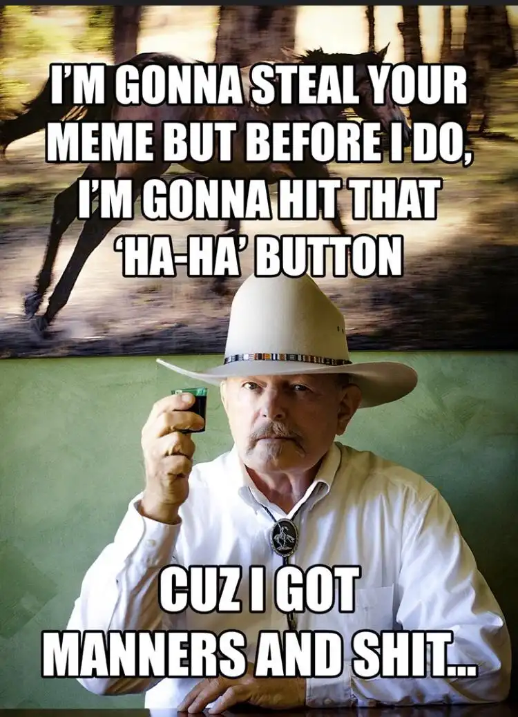 A man in a cowboy hat and white shirt holds a shot glass, looking sternly at the camera. Behind him, a blurred image of a…