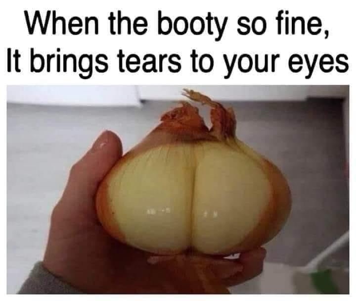 A hand holds a yellow onion that has been sliced open to reveal a shape resembling human buttocks. The overlaid text reads…