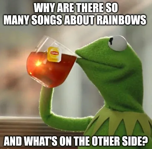A green frog puppet, Kermit the Frog, is shown sipping tea from a glass mug with a Lipton tea bag visible. He has a slightly…