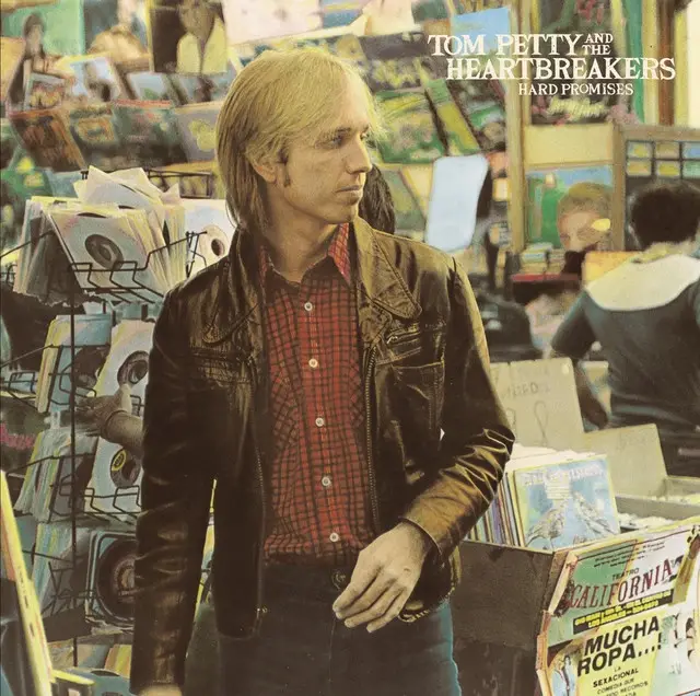 The image is the album cover for 'Hard Promises' by Tom Petty and the Heartbreakers, showing Petty in a leather jacket and…
