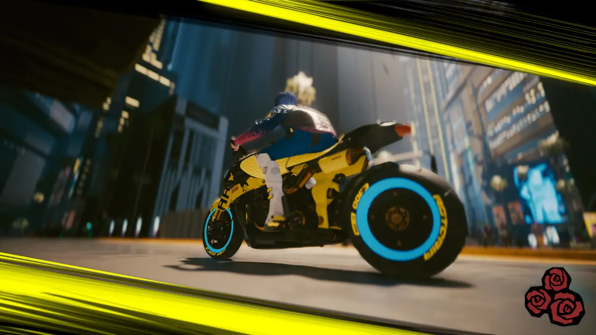 A video game character with blue hair rides a yellow motorcycle with glowing blue rims through a futuristic city street…