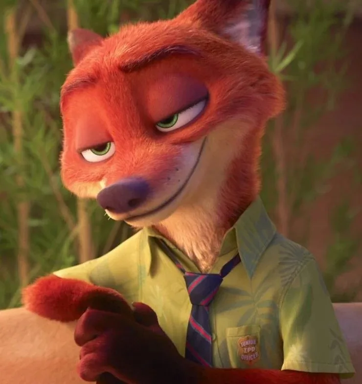 A close-up of the animated fox character Nick Wilde from Zootopia, wearing a green shirt and striped tie with a 'Junior ZPD…