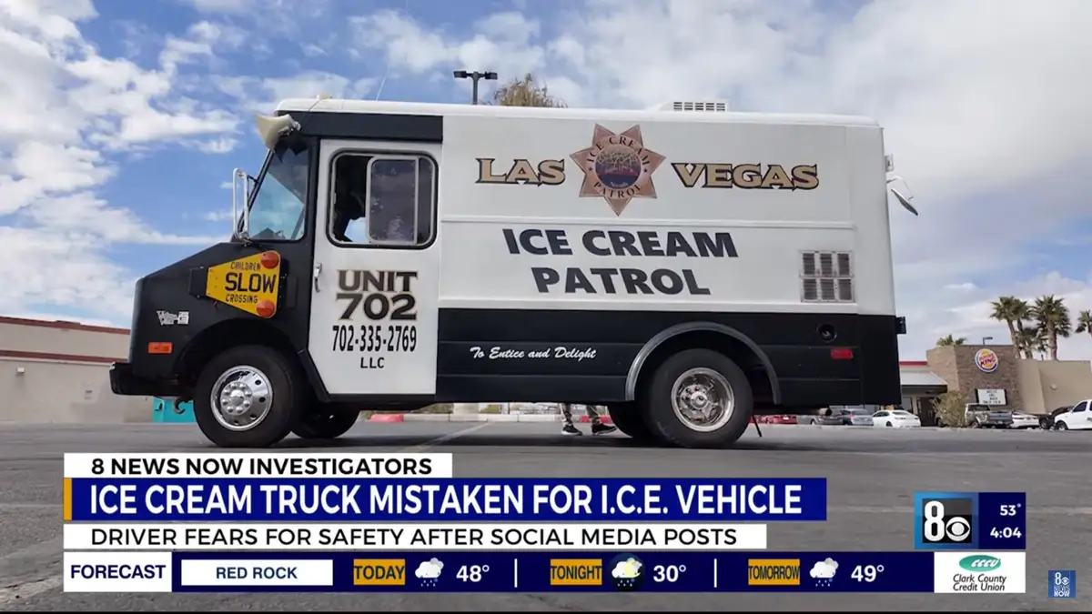 A white and black ice cream truck labeled 'LAS VEGAS ICE CREAM PATROL' with a sheriff's star logo is parked in a lot. A news…