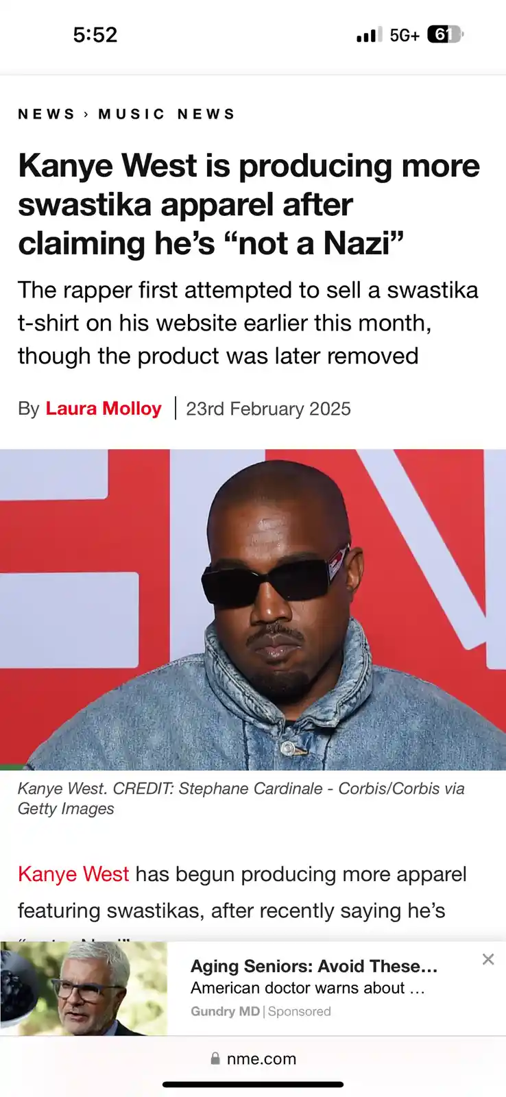 A screenshot of a news article from nme.com dated February 23, 2025, featuring a photo of Kanye West wearing sunglasses and…