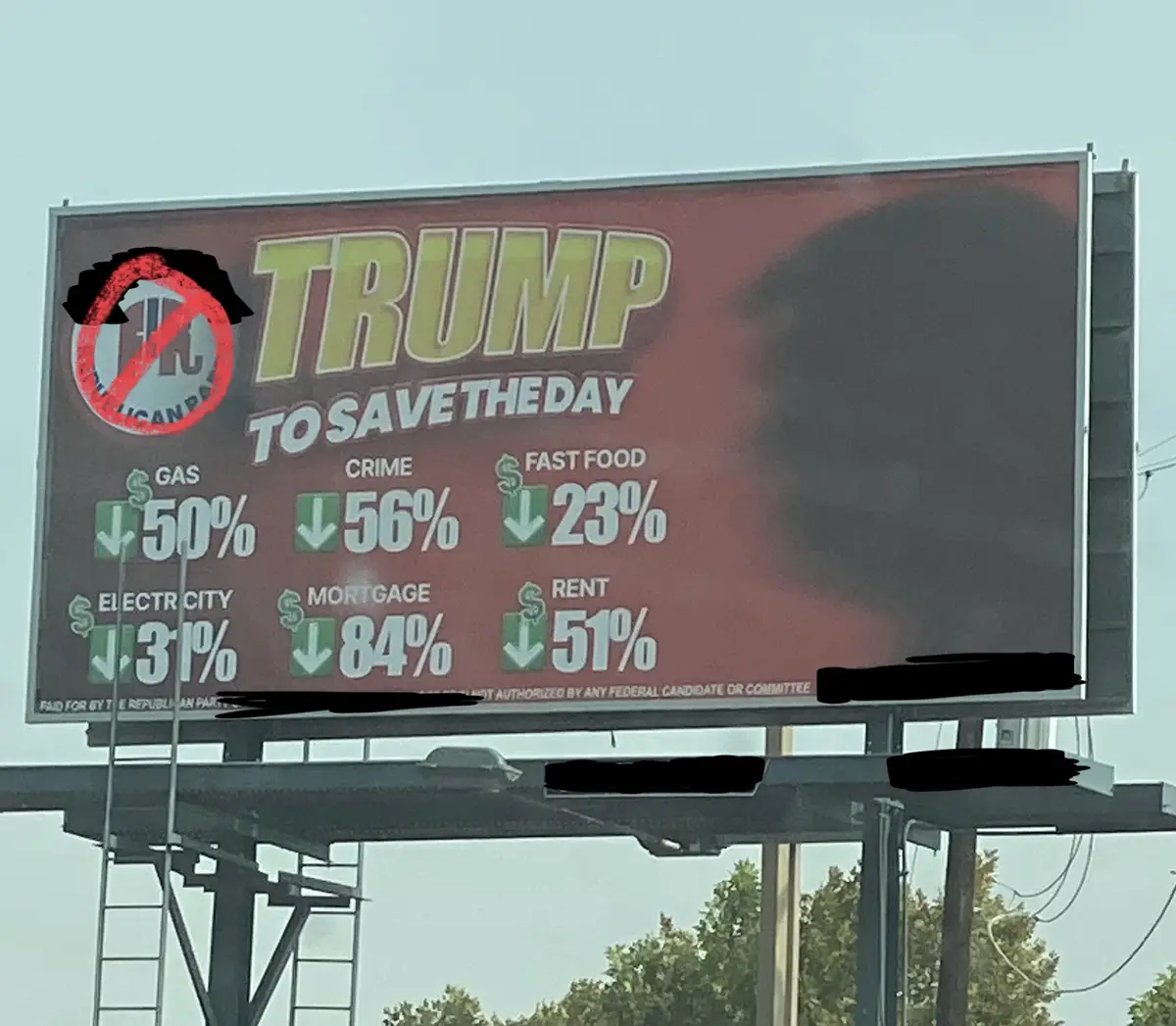 A red political billboard for Donald Trump with the headline 'TRUMP TO SAVE THE DAY' and claims of percentage decreases in…