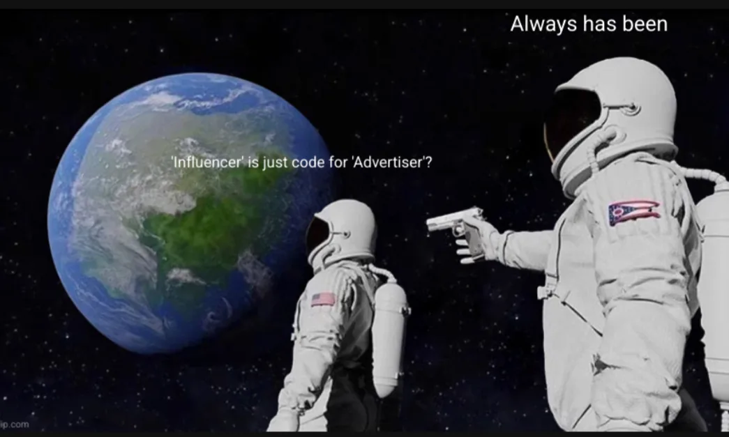 Two astronauts in space, one pointing a gun at the other, with Earth in the background. Text overlaid reads: 'Influencer' is…