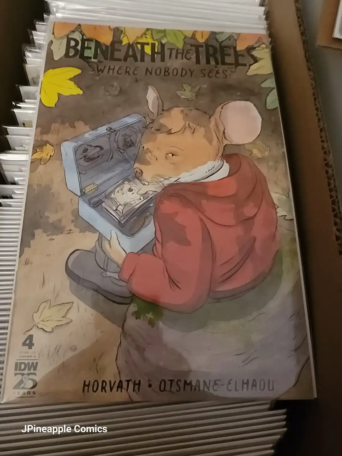 The image shows the cover of a comic book titled 'BENEATH THE TREES WHERE NOBODY SEES', featuring an anthropomorphic mouse…