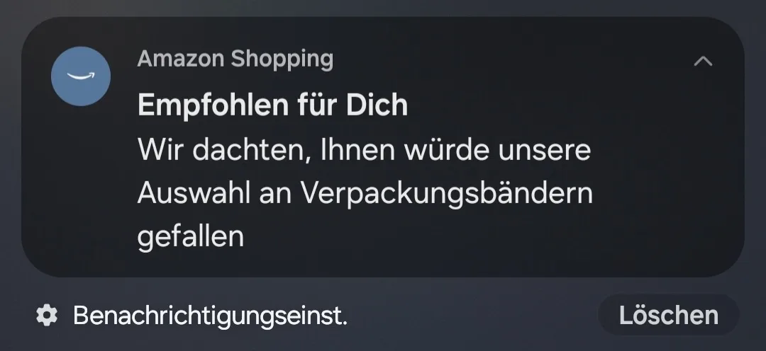 A dark-themed Amazon Shopping notification on a mobile device interface, featuring the Amazon logo and German text…